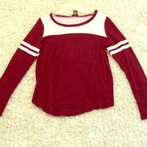 Rue 21 in a medium long sleeve shirt.